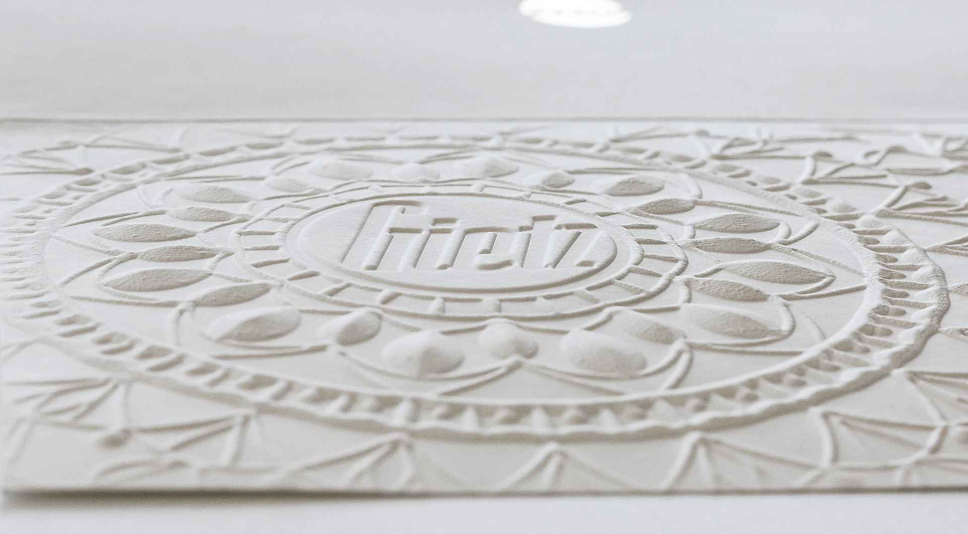 blind embossing of a New Year Card on a Gietz machine for hot foil stamping
